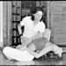 May be a black-and-white image of 1 person, performing martial arts and dancing